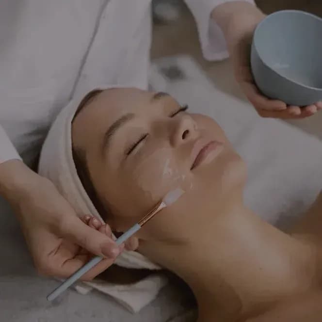 A chemical peel being applied with a brush