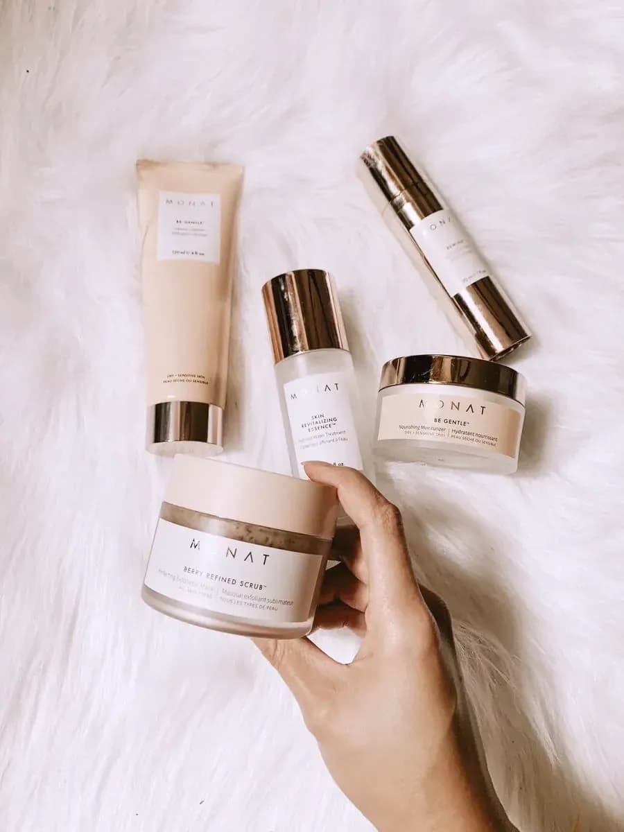 A short shelf of skincare in daylight