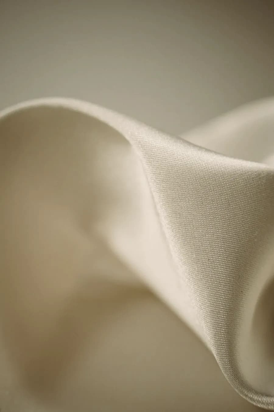 Folded silk under warm light